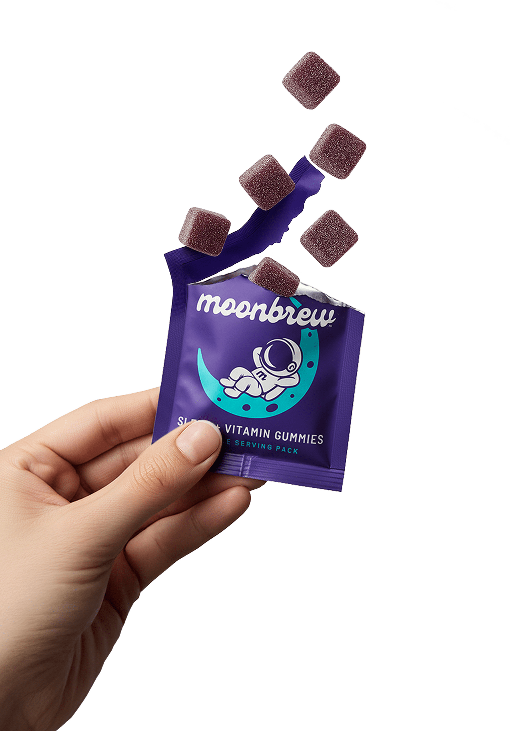 MoonBrew sleep vitamin gummies in a purple single-serve pouch, held in hand with gummies spilling out.